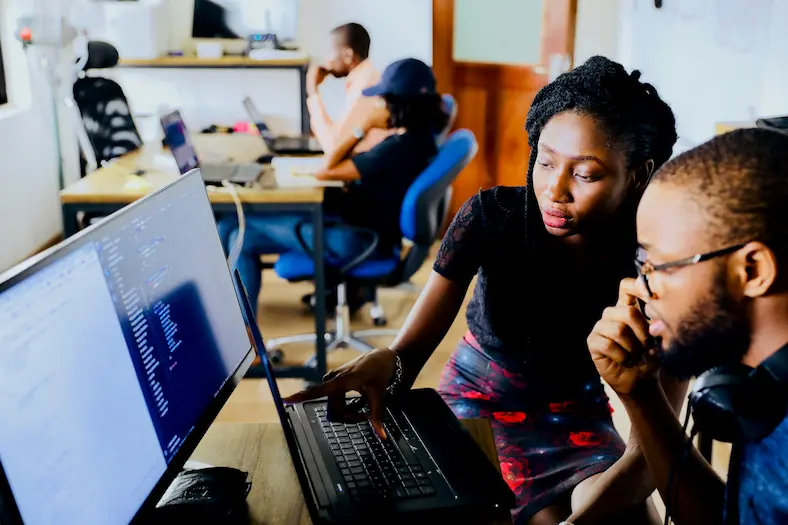 Black technology professionals working together on architecting a growth engine to drive business growth via e-mail marketing-SuperCamDigitals.